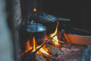 Cast iron Dutch ovens over an open file
